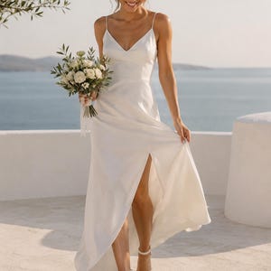 Ivory genuine leather bridal shoes with an elegant 8 cm block heel and pearl straps.