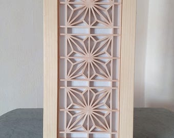 Kumiko mural with asa-no-ha inlays on Shoji paper