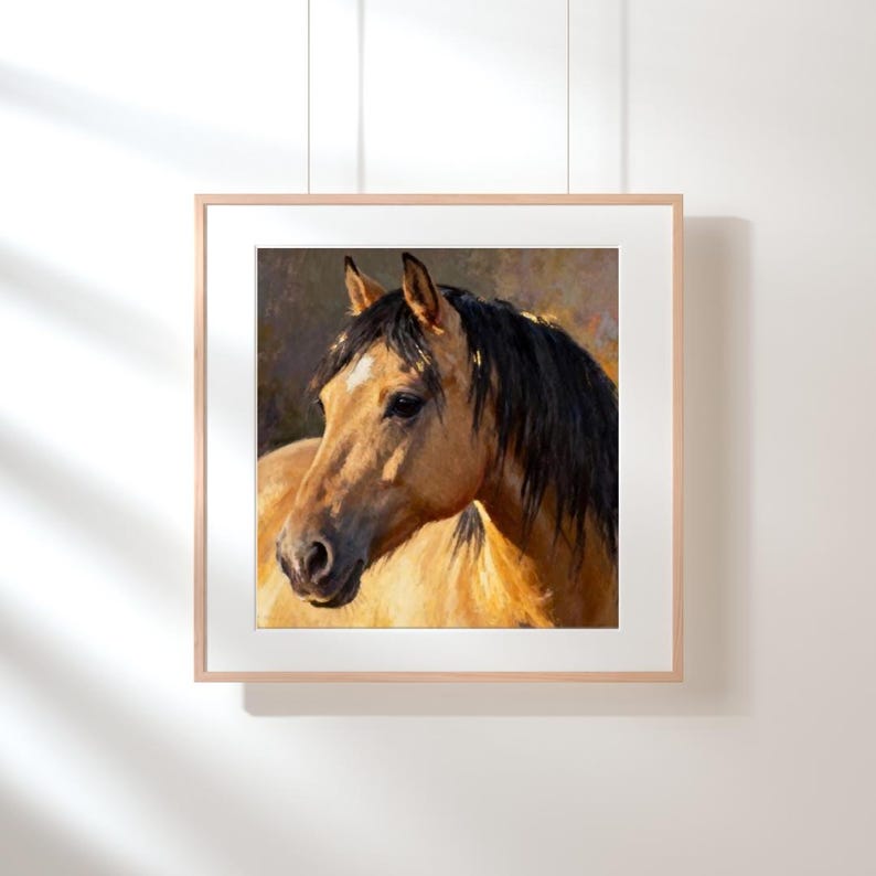 May include: A square framed wall art print featuring an oil painting of a buckskin horse with a black mane and a small white star on its forehead. The horse is shown from the chest up, facing slightly to the left against a dark background.