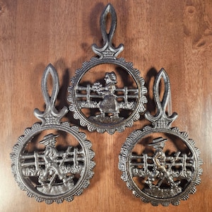 Vintage Cast Iron Trivets Amish Boy & Girl Design Rustic Kitchen Decor Set Of 3