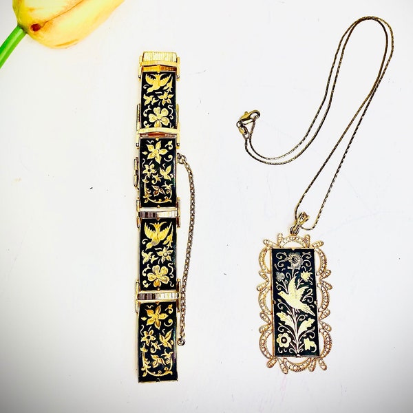 Vintage Jewelry Gold-tone & Bird Damascene Pendant on an 18 Karat Chain.