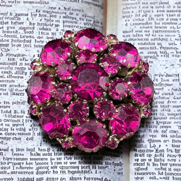 1950s vintage Weiss signed domed brooch, featuring bright pink magenta prong-set rhinestones