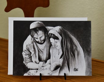Questo biglietto di auguri natalizio raffigura la scena della natività.