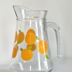 Vintage orange juice carafe