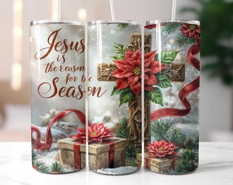 May include: A stainless steel tumbler with a Christmas-themed design. The tumbler features a cross adorned with poinsettias, a gift box, and the text "Jesus is the reason for the Season" in brown script. Red ribbon accents the design.
