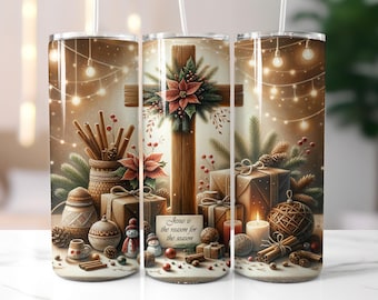May include: A tumbler featuring a Christmas-themed design with a wooden cross adorned with poinsettias and greenery. The design includes wrapped gifts, candles, cinnamon sticks, and the text "Jesus is the reason for the season."