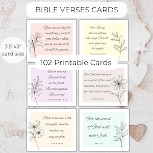 May include: A set of 102 printable Bible verse cards, each measuring 8.89cm x 7.62cm. The cards display inspirational quotes with floral designs on pastel backgrounds. The text "Bible Verses Cards" is at the top of the image.