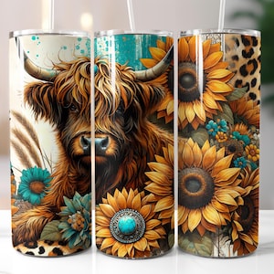 May include: Three stainless steel tumblers with a cow, sunflowers, and leopard print design. The cow has long brown fur and horns. The sunflowers are yellow and orange with turquoise accents. The leopard print is tan and brown.