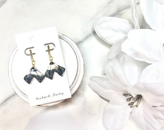 Black, white, and gold V earrings