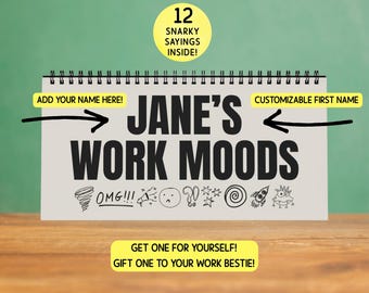 May include: A spiral-bound notepad with the text "JANE'S WORK MOODS" in bold black letters. The notepad includes the text "12 Snarky Sayings Inside!" and various cartoon doodles. The notepad is on a wooden surface with a green background.