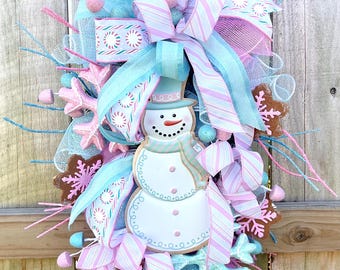 Pastel Snowman Winter Wreath. Pink & Blue Holiday Door Decor with Glitter Snowflakes Swag. Candy theme swag for Christmas