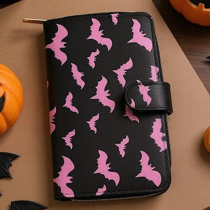 May include: A rustic wooden sign with the text "Welcome to our home" in white lettering. The sign features a distressed finish and a simple, inviting design, perfect for a front porch or entryway.