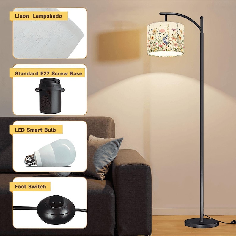 Puede incluir: Una l&aacute;mpara de pie negra con forma de arco y una pantalla con estampado floral. La l&aacute;mpara incluye un interruptor de pie, una bombilla LED inteligente y una base de rosca E27 est&aacute;ndar. La pantalla es blanca con un dise&ntilde;o floral colorido.