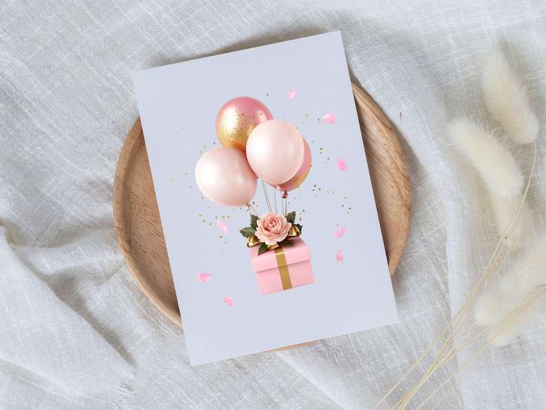 May include: A pink gift box with a gold ribbon is tied with a bow and surrounded by pink and gold balloons. The gift box is sitting on a white background with pink confetti.