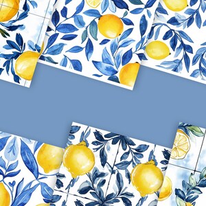May include: A set of six square tiles with a white background and a repeating pattern of blue leaves and yellow lemons. The tiles are perfect for creating a unique and stylish accent wall in any room.