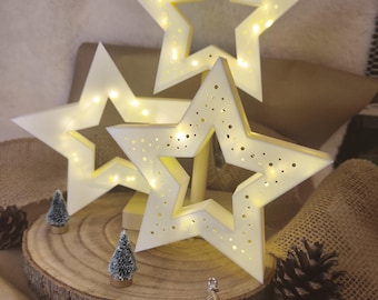 Lighted star with integrated LED lighting, available on a stand or freestanding.