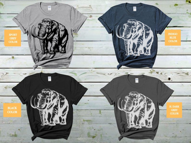 May include: Four t-shirts with a white graphic of a woolly mammoth on a black, dark grey, sport grey, and indigo blue background. The text "Sport Grey Color", "Black Color", "Indigo Blue Color", and "IL Dark Grey Color" is printed on each shirt.