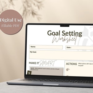 May include: A digital goal setting worksheet on a laptop screen. The worksheet is titled "Goal Setting Worksheet" and includes sections for "Name", "My Goal", "Make it SMART", and "Actions".