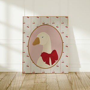 May include: A white goose with a red bow tie in a pink oval frame on a background of white and gray stripes with red cherries.