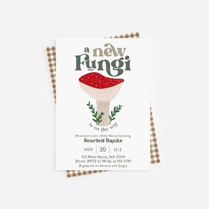 May include: A baby shower invitation with a mushroom illustration and the text "a new Fungi is on the way". The invitation is for Scarlett Banks and includes the date, time, and location of the shower.