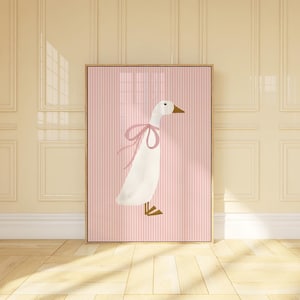 May include: A white goose with a pink bow on its neck, standing on a pink and white striped background.