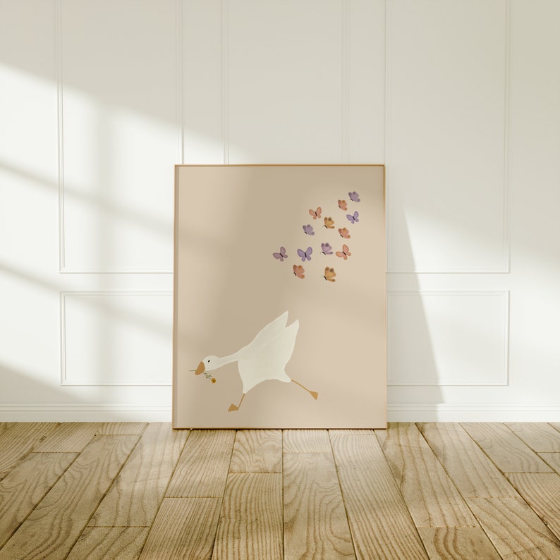 May include: A white goose with a pink beak runs to the right, chasing a flock of purple and orange butterflies on a light pink background.
