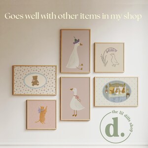 May include: A collection of framed art prints featuring whimsical illustrations of animals, including a goose wearing a hat, a cat, and a bear. The prints are in soft pastel colors and have wooden frames. The text "Goes well with other items in my shop" is at the top.