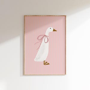 May include: A white goose with a pink bow on a pink and white striped background.