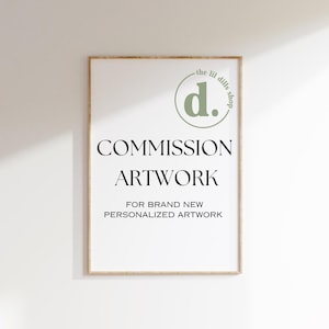 May include: A framed print with a light green circle logo that says "the lil dills shop" and "d." inside the circle. The text below the logo says "COMMISSION ARTWORK FOR BRAND NEW PERSONALIZED ARTWORK".