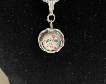 Collar floral con colgante de plata