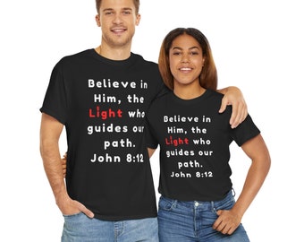 Believe in Him, the Light. For church, for groups, and daily wear Unisex Heavy Cotton black Tee