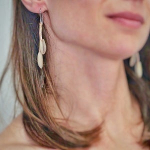 Date seeds earrings with leather cord 1mm width, Unique design from ANIMAccessories
