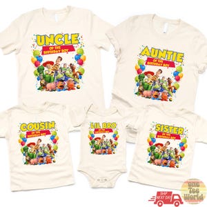 May include: Off-white t-shirts and a onesie featuring a colorful graphic of Toy Story characters. Text on the shirts reads "UNCLE", "AUNTIE", "COUSIN", "LIL BRO", and "SISTER" with "OF THE BIRTHDAY BOY" below each. Balloons and confetti surround the characters.