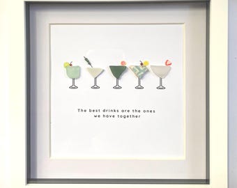 Sea Glass Cocktails wall art with quote. Handmade with Australian Sea Glass and Sea Pottery. Artwork is in a white 8x8 frame.