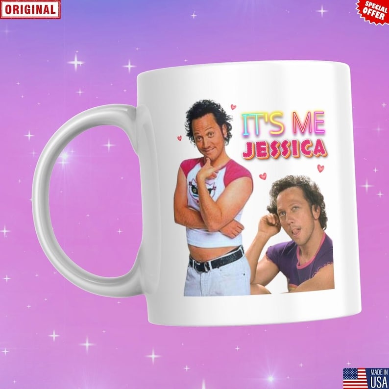May include: White ceramic mug featuring a colorful design with the text "IT'S ME JESSICA" and images of a person. The mug has a curved handle and is set against a purple background with stars.