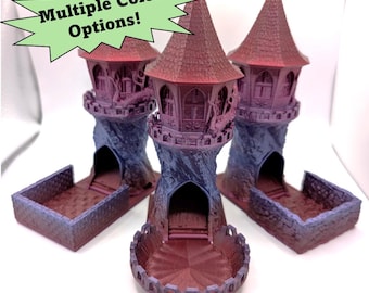 May include: Three 3D printed tower dice rolling trays in purple and red. The towers are detailed with windows and a spiral staircase. The trays are designed to hold dice.