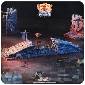 May include: A miniature terrain set for tabletop games, featuring a broken stone bridge with a spiked trap and a banner. The set is painted in shades of blue and gray, with a weathered look. The text "A Traveler's Guide Traps & Puzzles" is visible in the background.