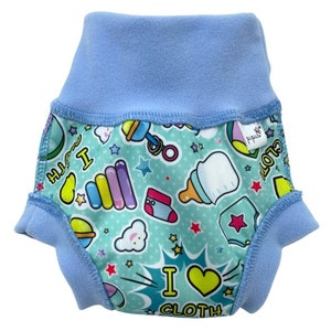 May include: Blue and green cloth diaper with a variety of colorful cartoon images, including stars, a bottle, a rattle, and the text "I love cloth".