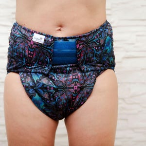 Reusable diaper for adults with an insert