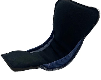 May include: A black and blue cloth diaper insert with a soft, plush lining. The insert is designed to be placed inside a cloth diaper for added absorbency.