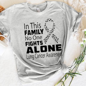 Lung Cancer Awareness Shirt, In This Family No One Fights Alone Tee, Cancer Support Clothing, Gifts for Cancer Warrior,Cancer Ribbon T-Shirt
