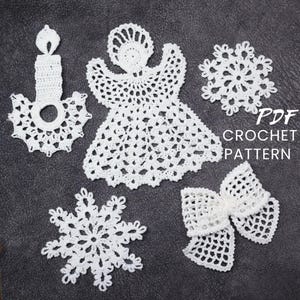 May include: Five white crocheted ornaments: an angel, a candle, a bow, and two snowflakes. The text "PDF CROCHET PATTERN" is in the upper right corner of the image.