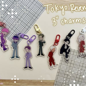 May include: Acrylic charms featuring characters from Tokyo Revengers, each approximately 3 inches in height. The charms depict various characters in detailed outfits, with different colored hair and outfits. Each charm has a lobster clasp for easy attachment.