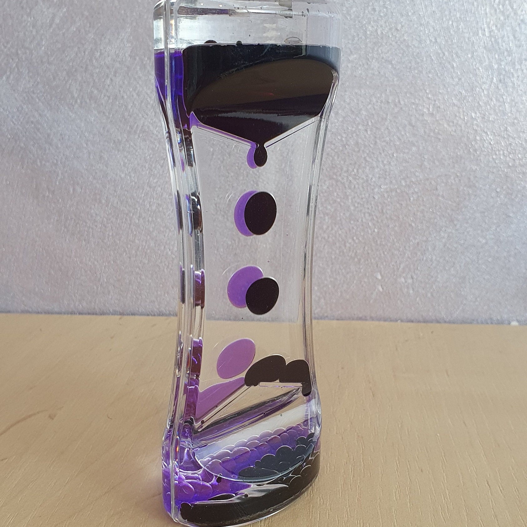 Liquid hourglass sale