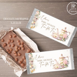 Puede incluir: Un diseño de envoltorio de barra de chocolate imprimible con un patrón floral y el texto "Lorras Baby Shower Time for Tea". El envoltorio mide 13,3 cm por 15,2 cm.