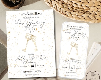 May include: A white invitation with gold glitter accents for a housewarming party. The invitation features a gold illustration of two keys and the text "Home Sweet Home, We Welcome You To Our Housewarming Party, Hosted by Ashley & Tara, Sunday November 15, 2023 at 7 PM, 123 Any Street, Any City, Registered at anywebsite.com".