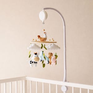 May include: A set of three ceramic mugs with a speckled, matte finish. The mugs are in shades of cream, light gray, and dark gray. Each mug has a simple, minimalist design, perfect for coffee or tea.