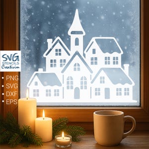 Puede incluir: Una escena invernal con una silueta de pueblo blanco sobre una ventana escarchada. Tres velas encendidas y una taza sobre una superficie de madera. La imagen incluye el texto "SVG STENCILS Creativim" y opciones de tipo de archivo.