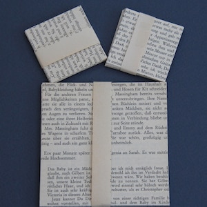geschnittenes Faltpapier aus alten Buchseiten