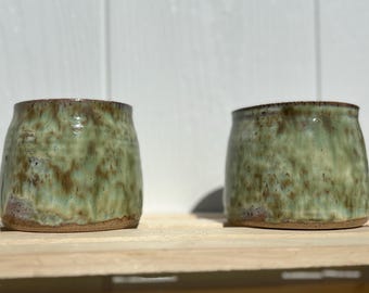 Set of two small ceramic jars